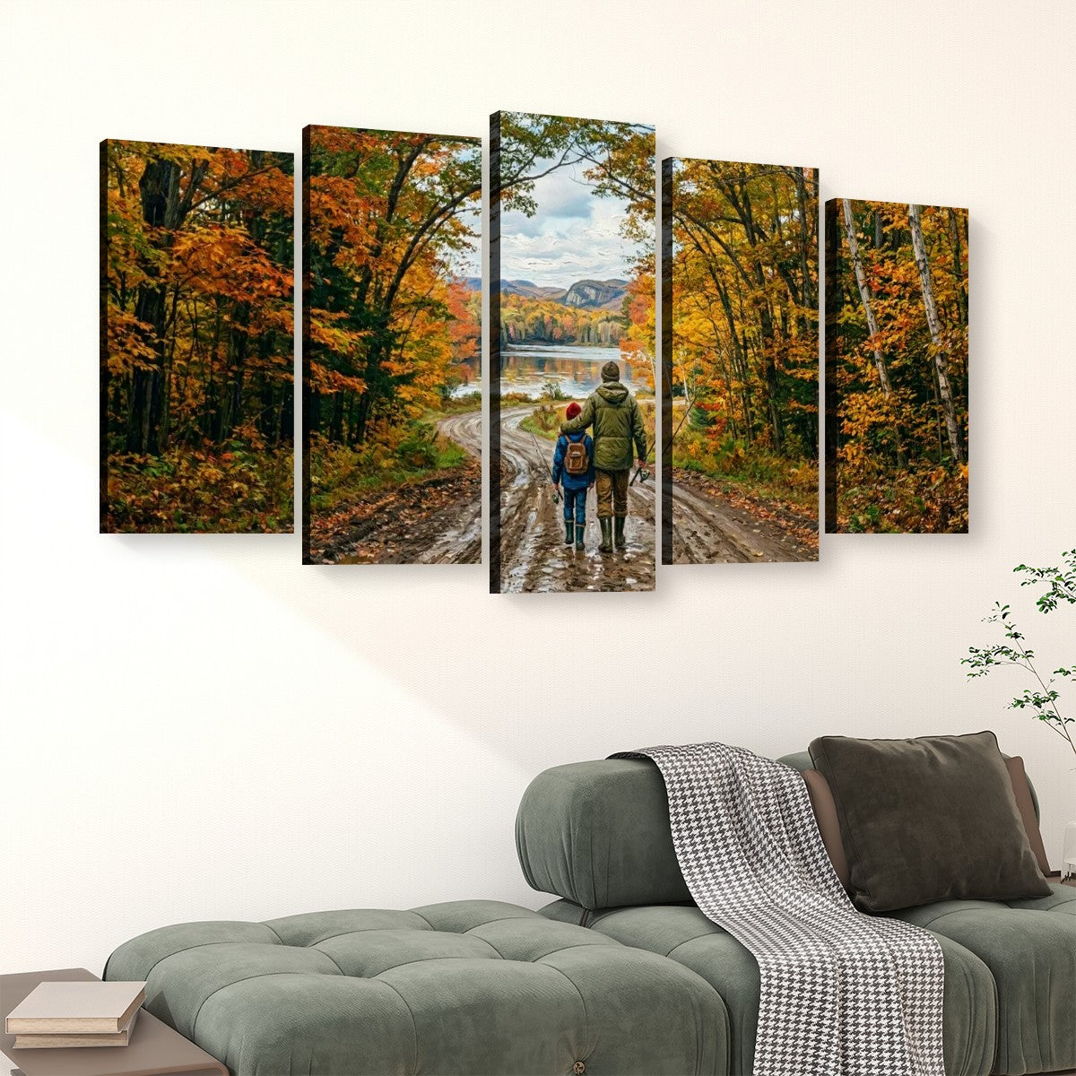 A five-panel canvas wall art set depicting a couple walking along a dirt path surrounded by colorful autumn trees near a lake, displayed above a green sofa in a living room setting.