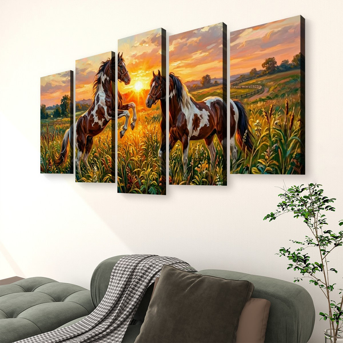 A five-panel canvas wall art set depicting two brown and white horses in a golden field at sunset, displayed on a white wall above a gray sofa in a living room setting.
