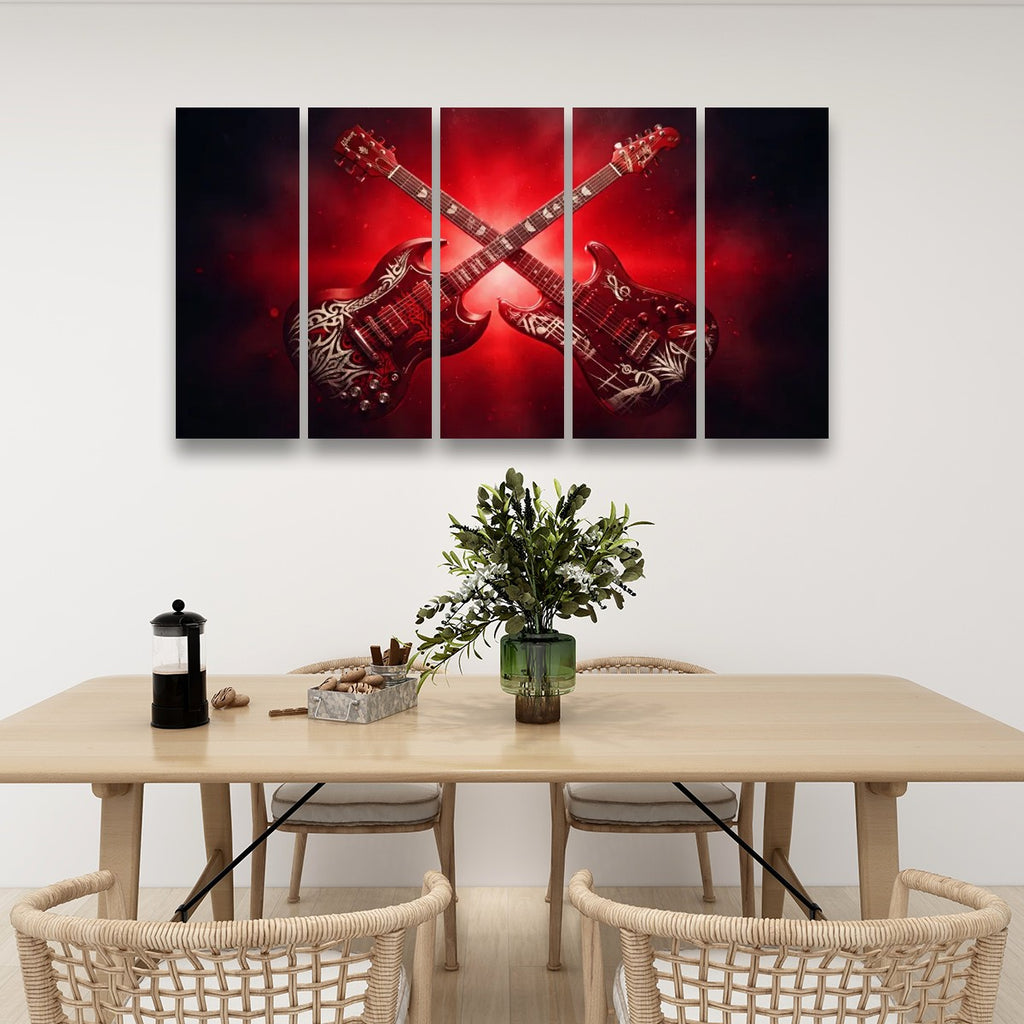 A four-panel canvas wall art set depicting two crossed electric guitars against a dramatic red and black background, displayed on a white wall above a wooden dining table with chairs and a vase.