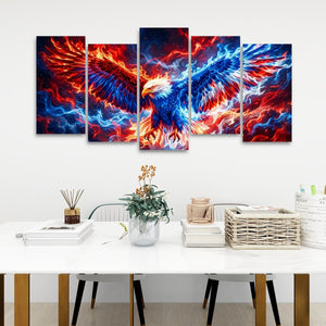 A five-panel canvas wall art set depicting a dramatic fiery phoenix with red and blue wings, displayed on a white wall above a styled dining table with books, a vase, and a basket.