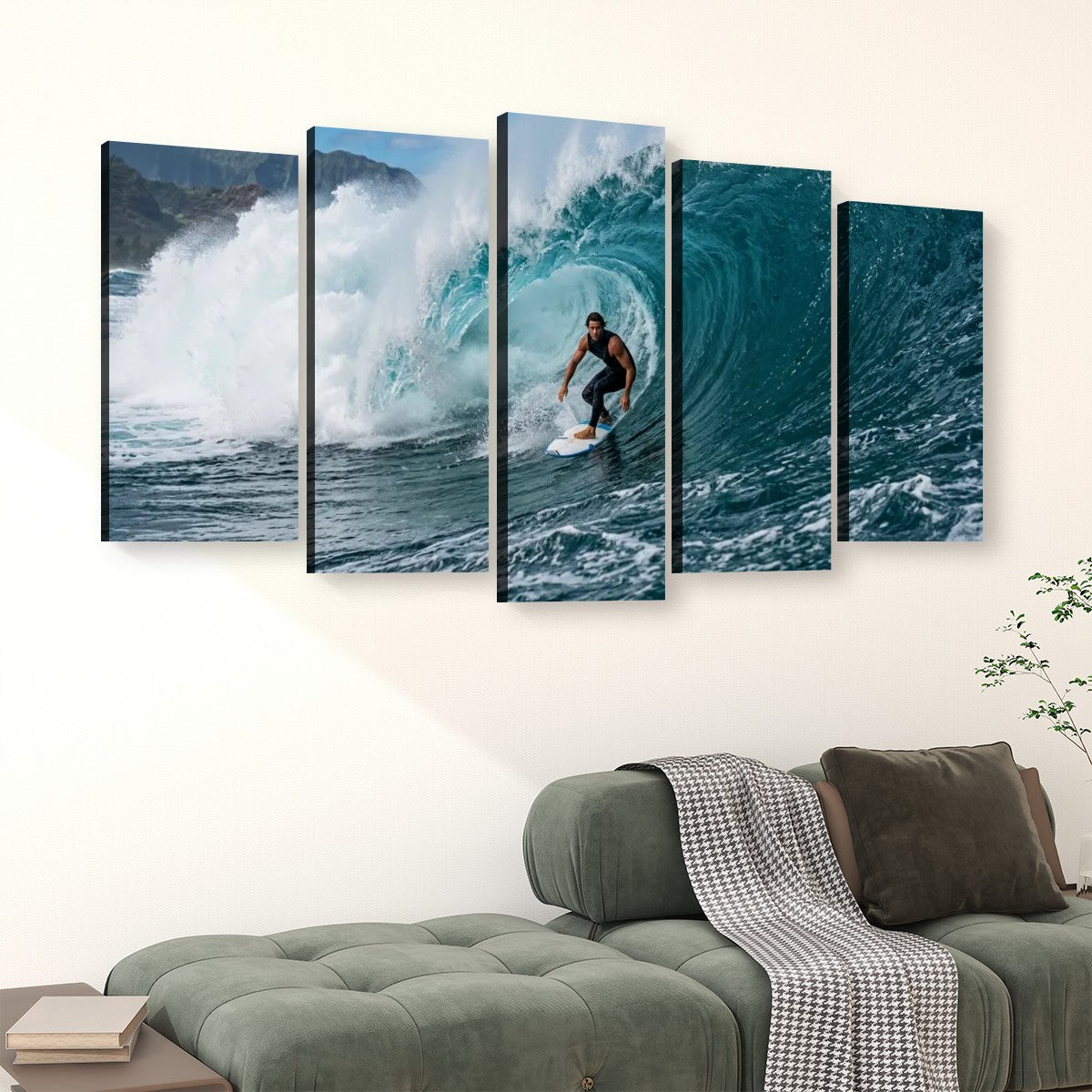 A five-panel canvas wall art set depicting a surfer riding a large blue wave, displayed above a green sofa in a modern living room setting.