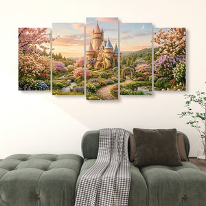 A five-panel canvas wall art set depicting a whimsical castle in a spring garden with blooming cherry trees, displayed above a green sofa in a living room setting.