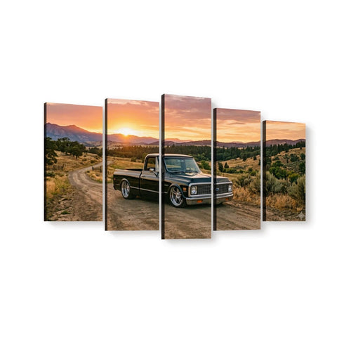 A five-panel canvas wall art set depicting a 1970 Chevy C10 Fleetside vintage pickup truck parked on a dirt road at sunset, with mountains and dry hills in the background, shown against a plain white wall.