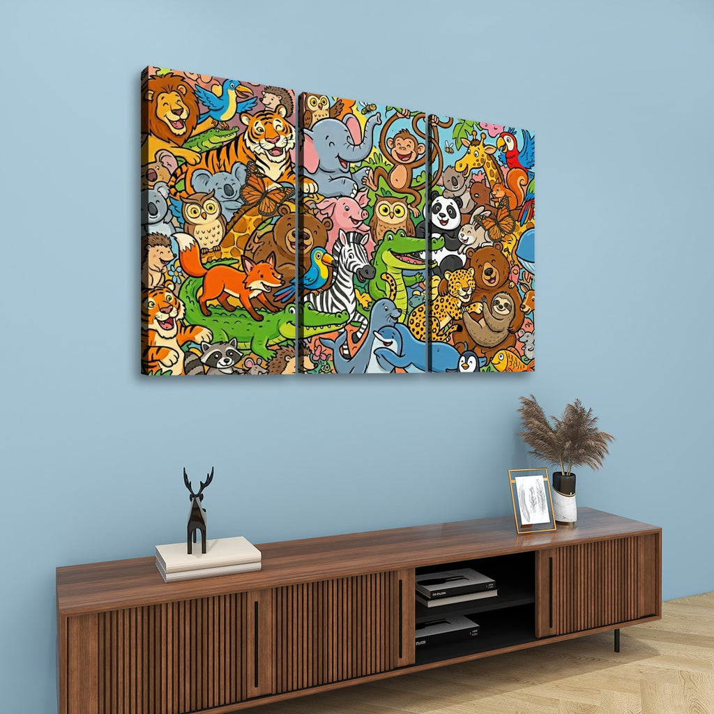A three-panel canvas wall art print featuring a colorful cartoon jungle scene with many animals, displayed above a wooden console table against a light blue wall.