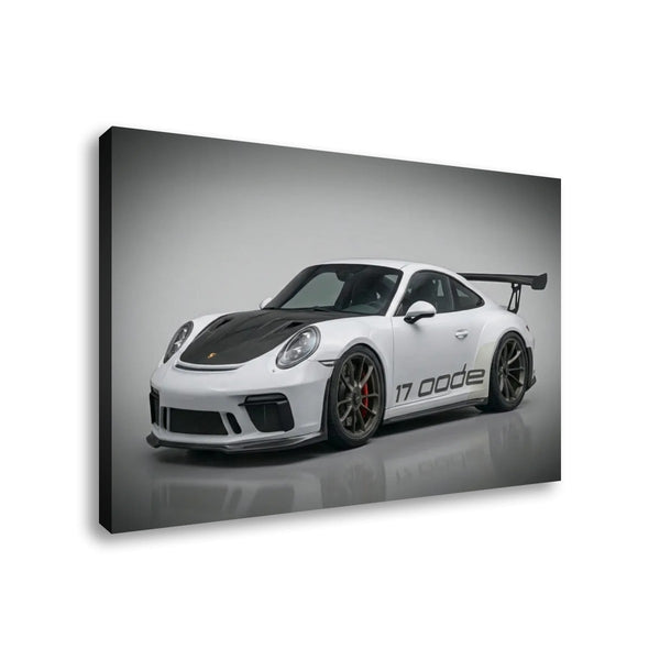A rectangular wall art print or canvas showing a white Porsche 911 GT3 with a black carbon-fiber hood and rear wing, photographed at an angle against a light gray studio background.