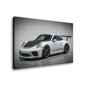 A rectangular wall art print or canvas showing a white Porsche 911 GT3 with a black carbon-fiber hood and rear wing, photographed at an angle against a light gray studio background.