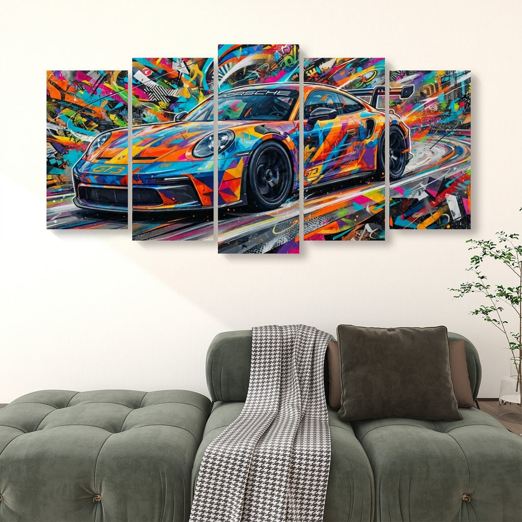 A multi-panel canvas wall art set depicting a colorful, abstract sports car, displayed above a green sofa in a modern living room setting.
