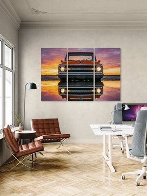 Modern office with a large wall art of a 1970 Chevrolet C10 truck at sunset.