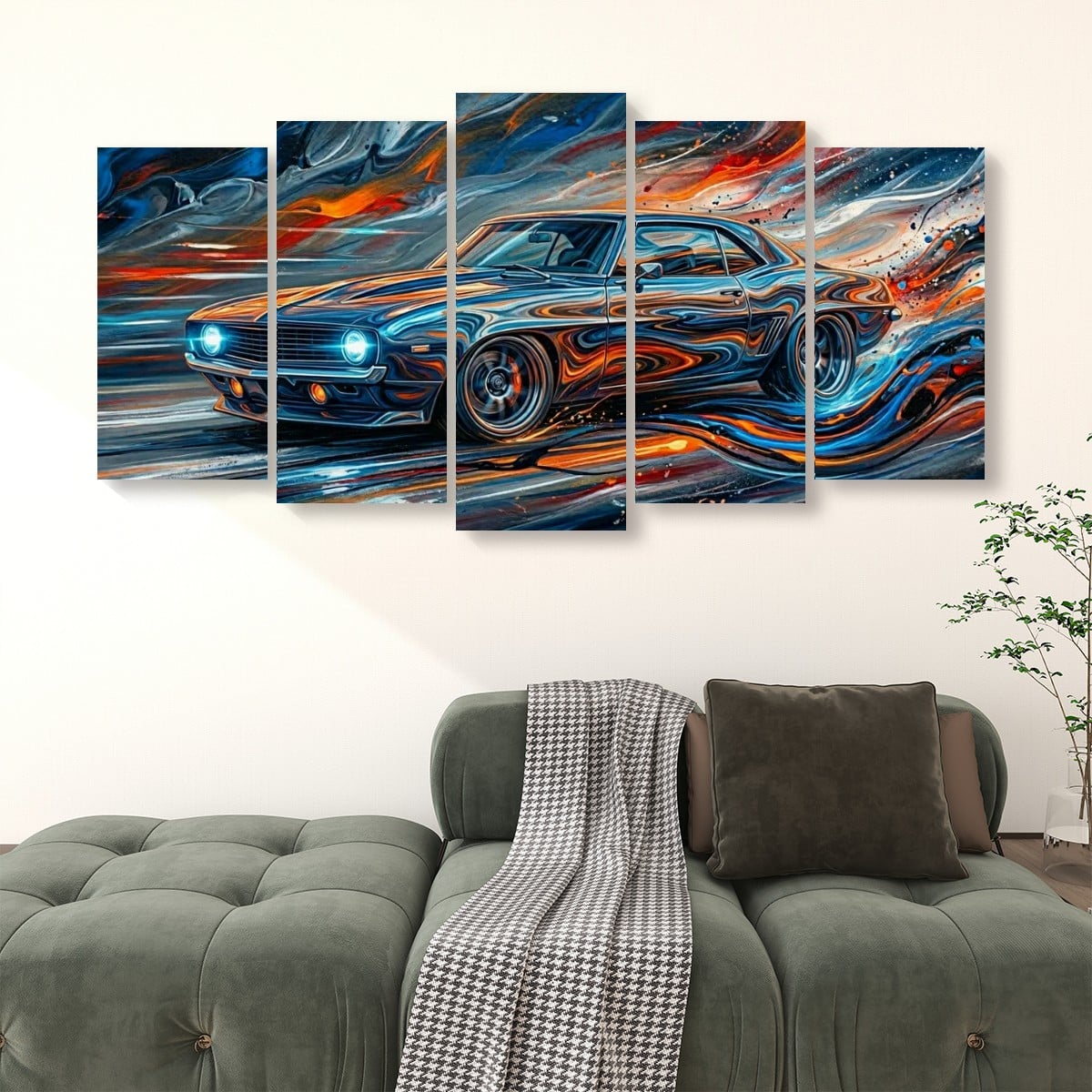A five-panel canvas wall art set depicting a stylized blue 1969  Camaro muscle car with swirling orange, red, and white brushstrokes, displayed above a green sofa in a living room setting.