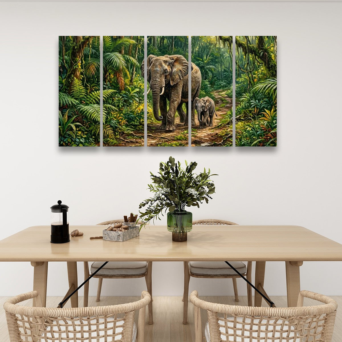 A five-panel canvas wall art set depicting a large elephant and a baby elephant walking through a lush green jungle, displayed on a white wall above a wooden dining table with chairs.