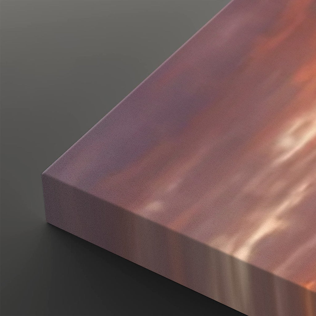 A close-up of a rectangular panel with a metallic, iridescent finish shifting between pink, purple, and copper tones, set against a dark gray background.