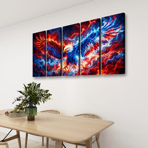 A four-panel canvas wall art set depicting a dramatic fiery phoenix or eagle in vivid red, orange, blue, and white tones, displayed on a white wall above a light wood dining table with chairs and a potted plant.