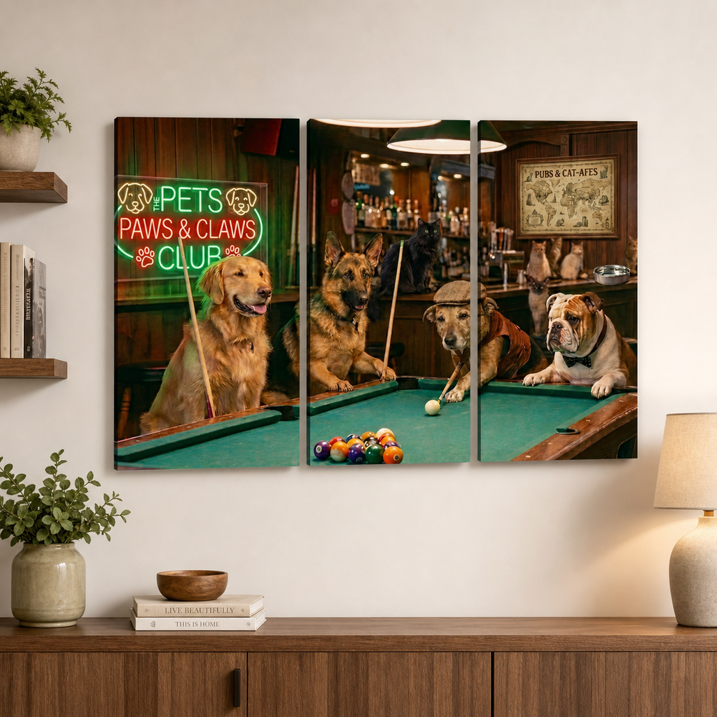 A three-panel canvas wall art print depicting three dogs playing pool in a bar, displayed on a white wall above a wooden console table with a lamp and plants.