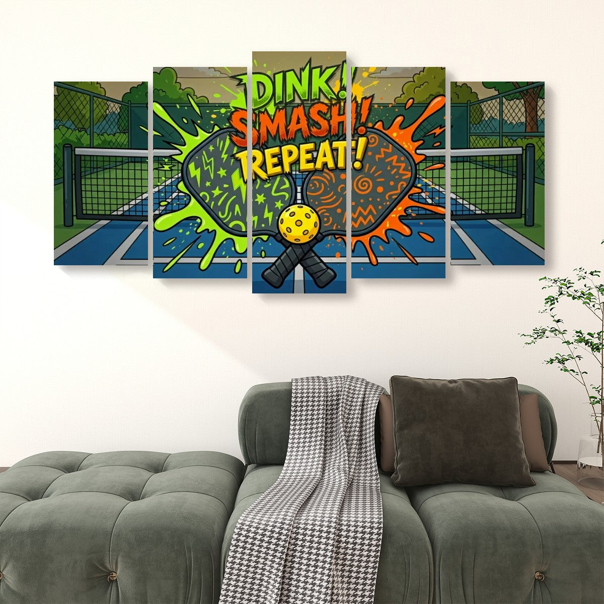 A 5-panel canvas wall art set depicting a pickleball court scene with the text 'DINK! SMASH! REPEAT!' in colorful paint splatters, displayed above a green sofa in a living room setting.