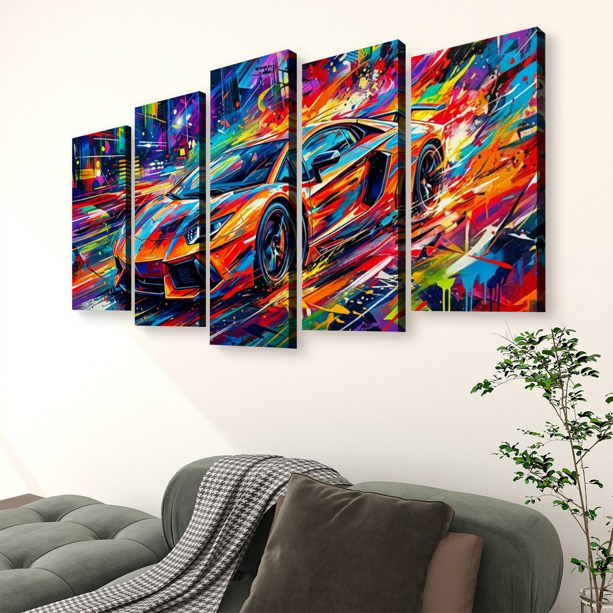 A five-panel canvas wall art set depicting a colorful, abstract sports car scene, displayed on a white wall above a modern gray sofa with a throw blanket and a small potted plant.