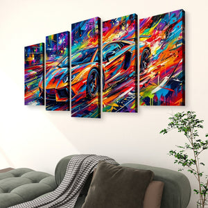 A five-panel canvas wall art set depicting a colorful, abstract sports car scene, displayed on a white wall above a modern gray sofa with a throw blanket and a small potted plant.