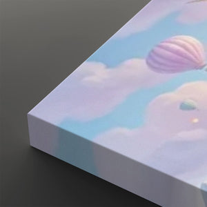 A close-up of a rectangular canvas or print showing a pastel sky scene with soft clouds and a pink-purple hot air balloon, photographed against a dark gray background.