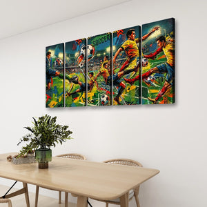 A four-panel canvas wall art set depicting a vibrant, colorful soccer match scene, displayed on a white wall above a light wood dining table with chairs and a potted plant.