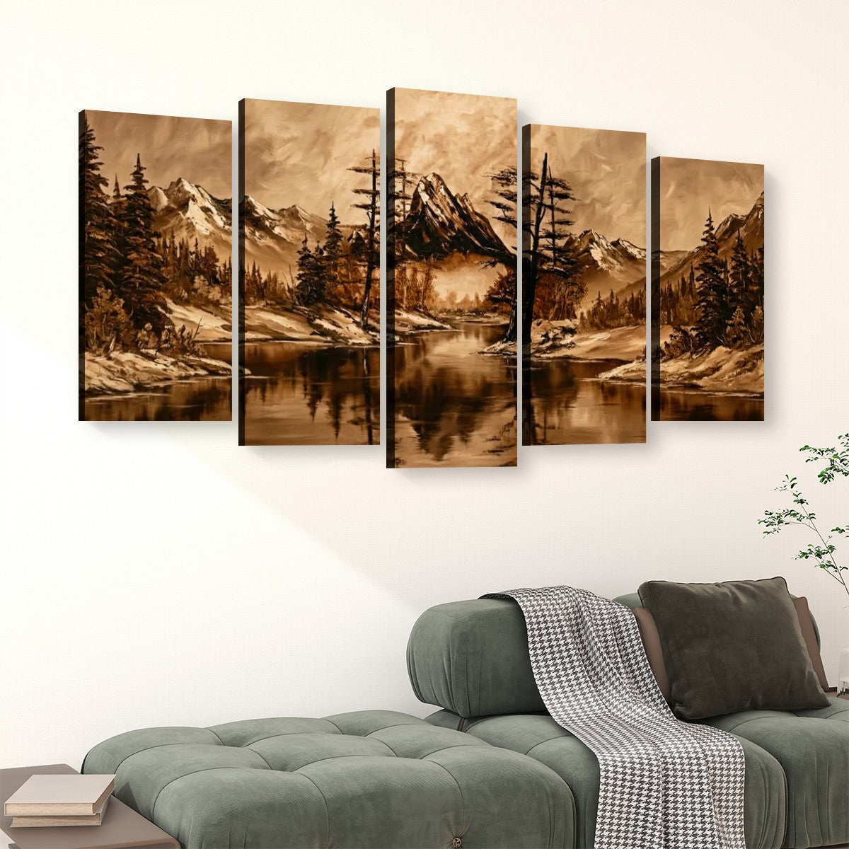A five-panel canvas wall art set depicting a sepia-toned mountain landscape with a lake and pine trees, displayed above a green sofa in a living room setting.