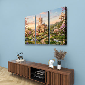 A three-panel canvas wall art set depicting a whimsical castle in a colorful garden, displayed on a light blue wall above a wooden console table with decorative items.