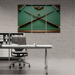 Modern office setup with a pool table scene on the wall, featuring billiard balls and cues.