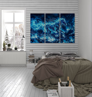 Modern bedroom with a large abstract blue painting on the wall.