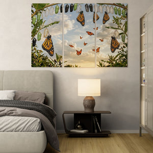 Bedroom with butterfly-themed wall art above a bed
