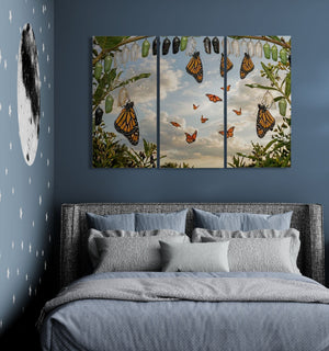 Bedroom with a butterfly-themed wall art above the bed