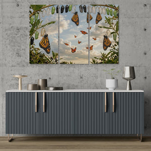 Modern interior with a gray sideboard and a large butterfly-themed wall art above it.