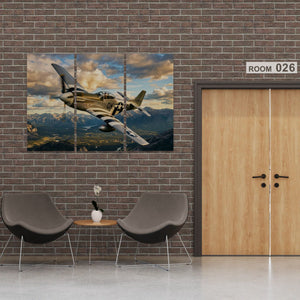 Modern interior with a large P-51 Mustang airplane painting on a brick wall, two chairs, and a small table.