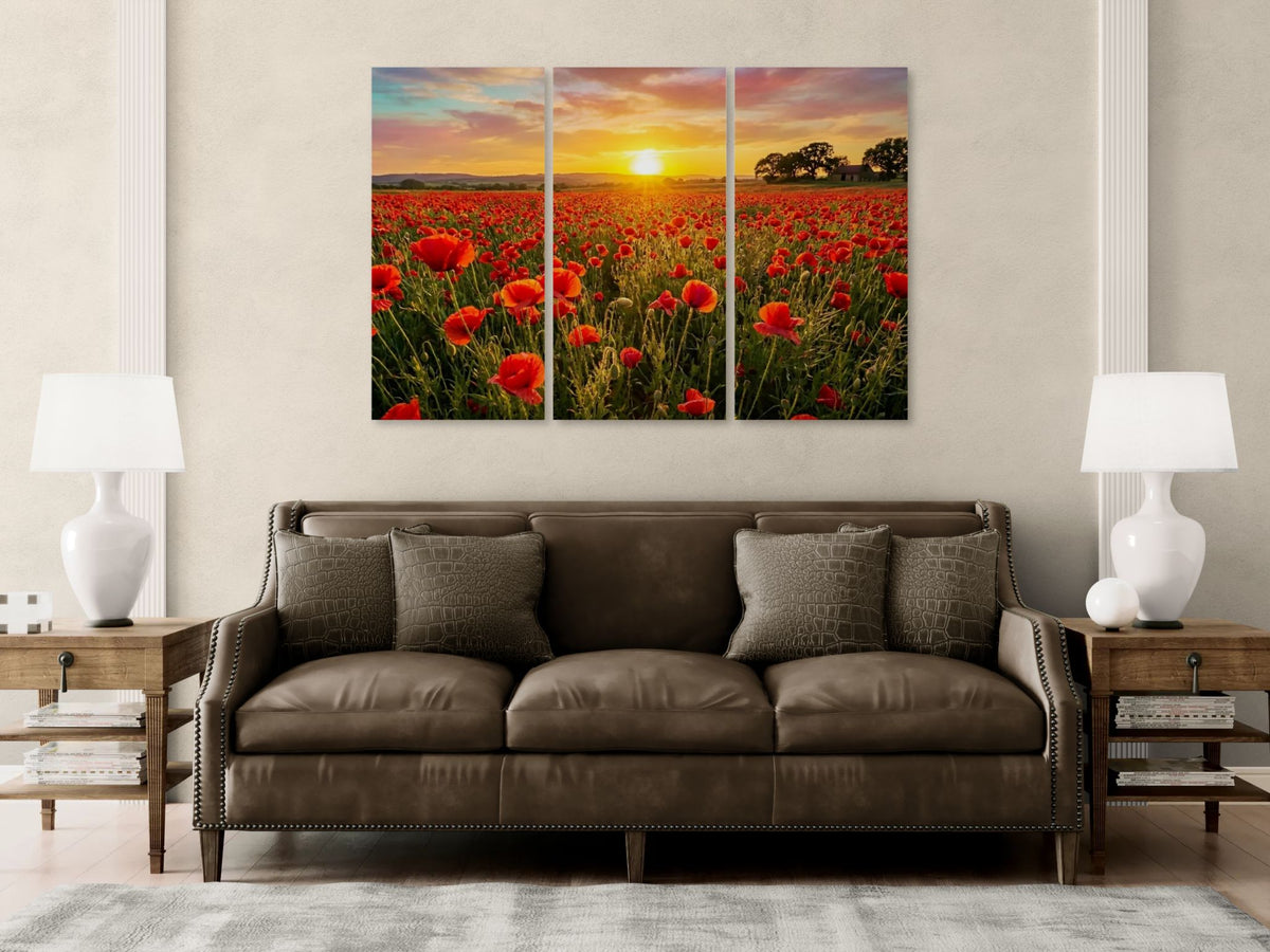 Brown sofa in a living room with a large wall art of a sunset over a field of red poppie flowers.