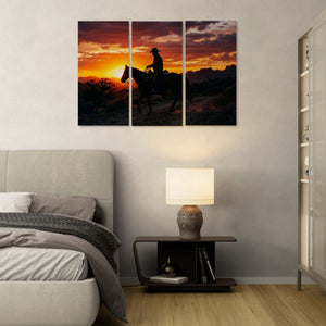 Bedroom with a large wall art piece of a horse and rider at sunset.