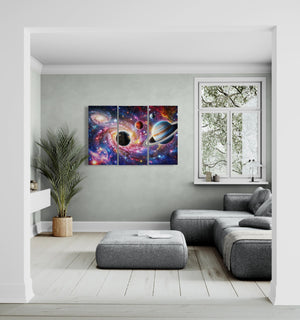 Living room with a modern sofa, plant, and wall art depicting space scenes.