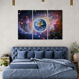 Bedroom with a large bed and a cosmic wall art above it