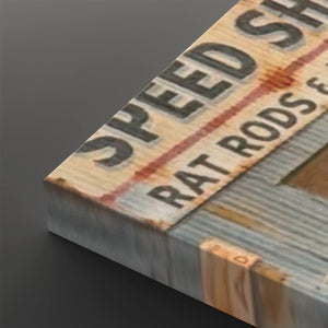 A close-up angled view of a rectangular product with a distressed vintage-style label print reading 'SPEED' and 'RAT RODS' on a dark gray background.