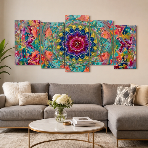 A 5-panel canvas wall art set featuring a vibrant, colorful mandala design, displayed on a beige wall above a modern gray sectional sofa in a living room setting.