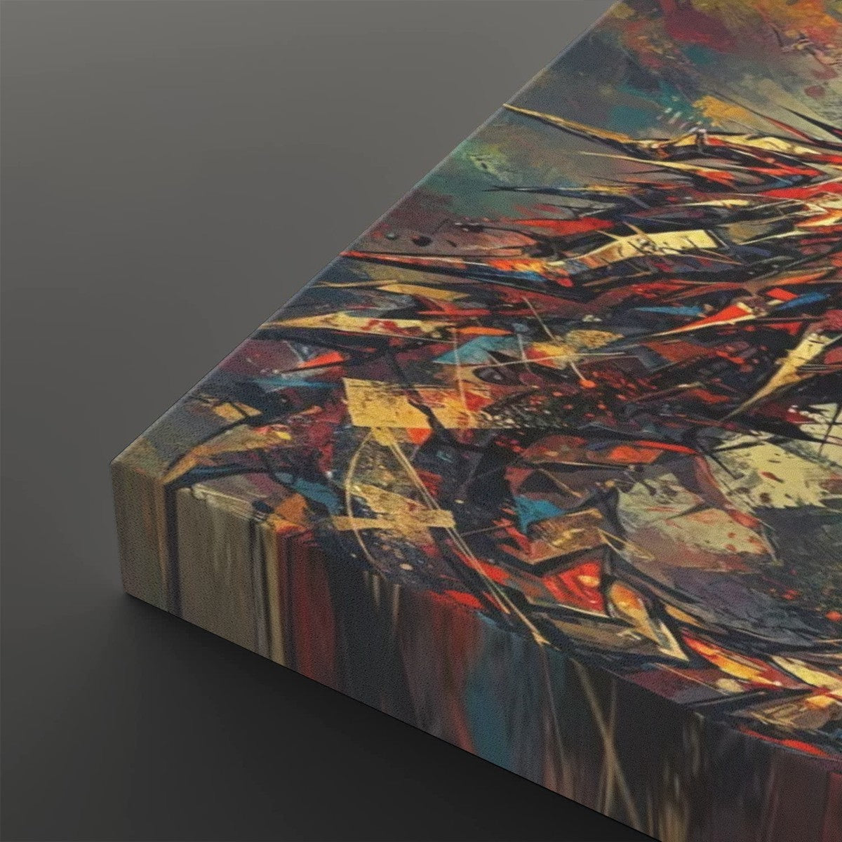 Abstract canvas wall art shown at an angle, featuring a dynamic composition of expressive brushstrokes and splatters in red, orange, blue, yellow, black, and white on a dark gray background.