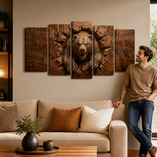 A man stands beside a beige sofa in a modern living room, looking at a five-panel wooden wall art set depicting a detailed bear head carved from wood textures. The room has a warm neutral color palette with a beige wall, a light sofa, and a wooden coffee table in the foreground.