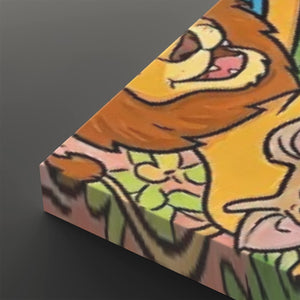 A close-up angled view of a colorful illustrated product, showing a cartoon lion face with yellow fur, brown mane, pink mouth, and green floral details on a dark gray background.