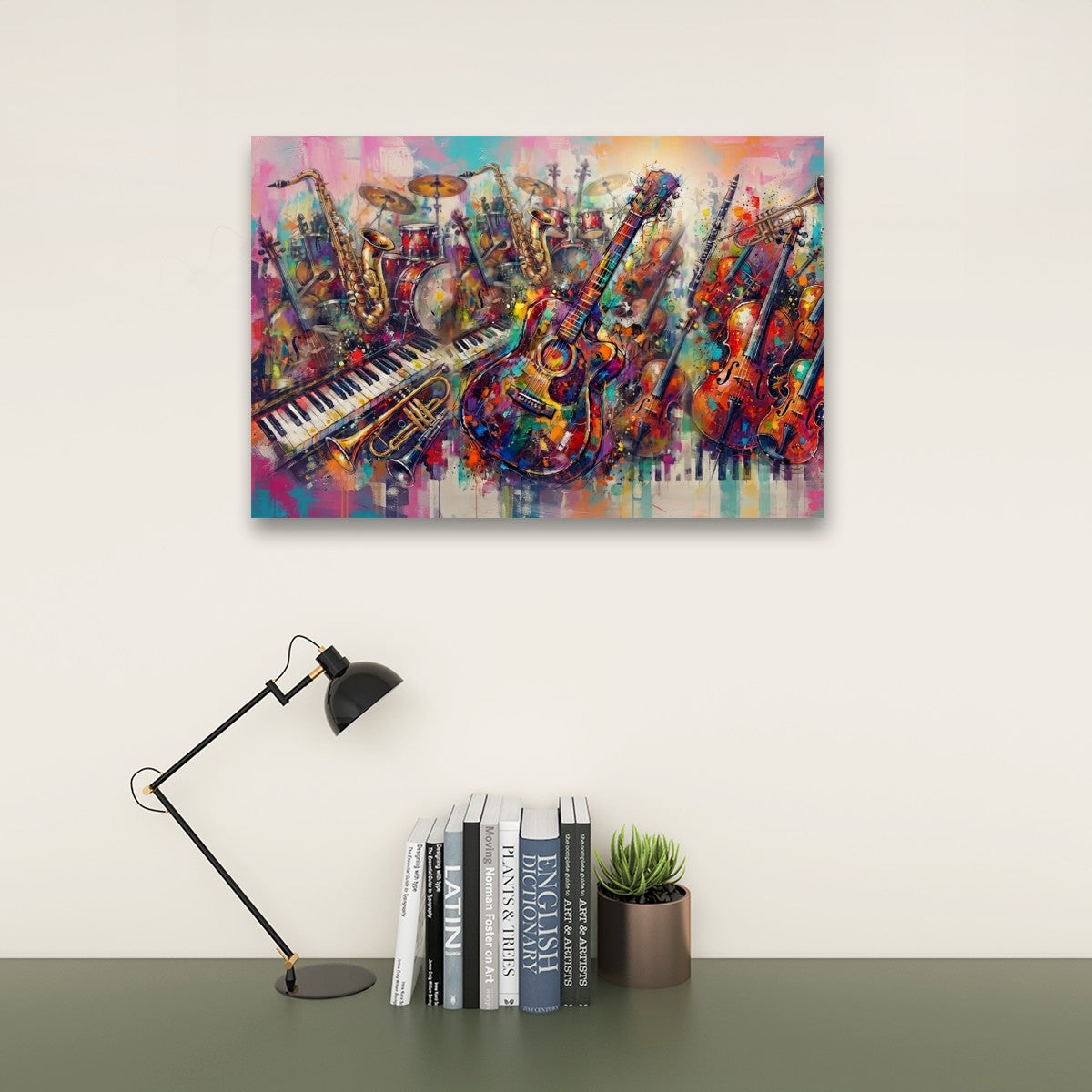 A colorful abstract canvas print of musical instruments, including guitars, a piano keyboard, and brass instruments, displayed on a wall above a desk with a black lamp, books, and a small succulent.