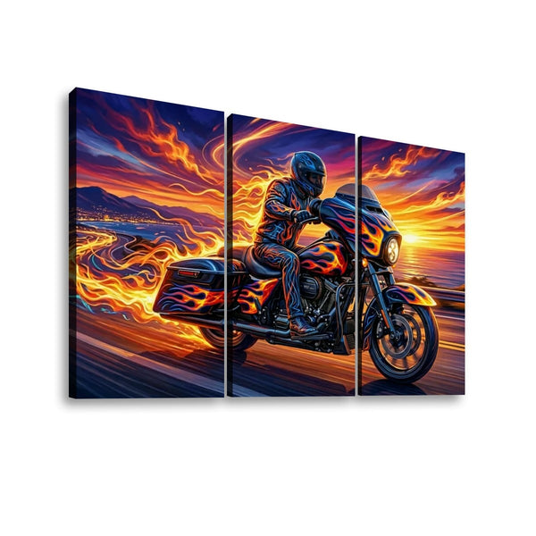 A three-panel canvas wall art print depicting a motorcycle with flame graphics, ridden by a silhouetted figure against a dramatic sunset sky over a road.
