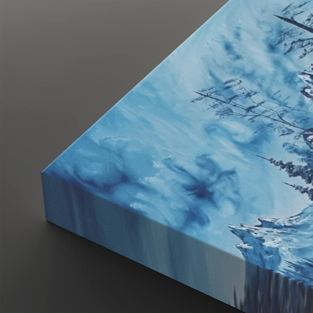 A close-up of a square canvas print showing a snowy blue winter landscape with dark tree branches and a dark gray background.