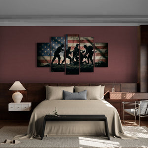 Bedroom with a large wall art piece featuring silhouettes of soldiers against an American flag.
