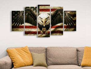 Five-panel wall art of an eagle with an American flag design above a sofa.