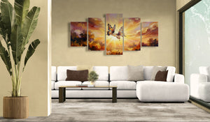 Living room with a white sofa, decorative pillows, and wall art depicting a butterfly over a sunset.