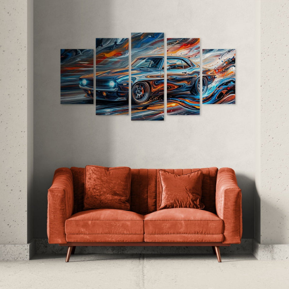 Five-panel wall art of a 1969 Camaro car on a gray wall above a red sofa.