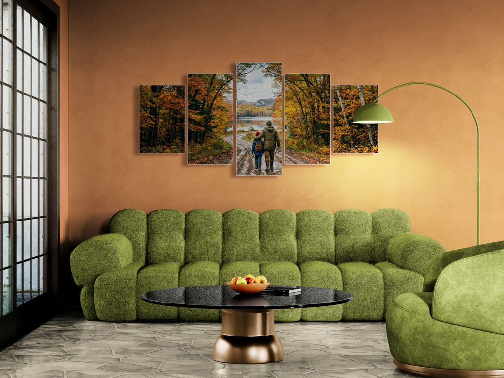 Green sofa in a living room with wall art depicting nature scenes.
