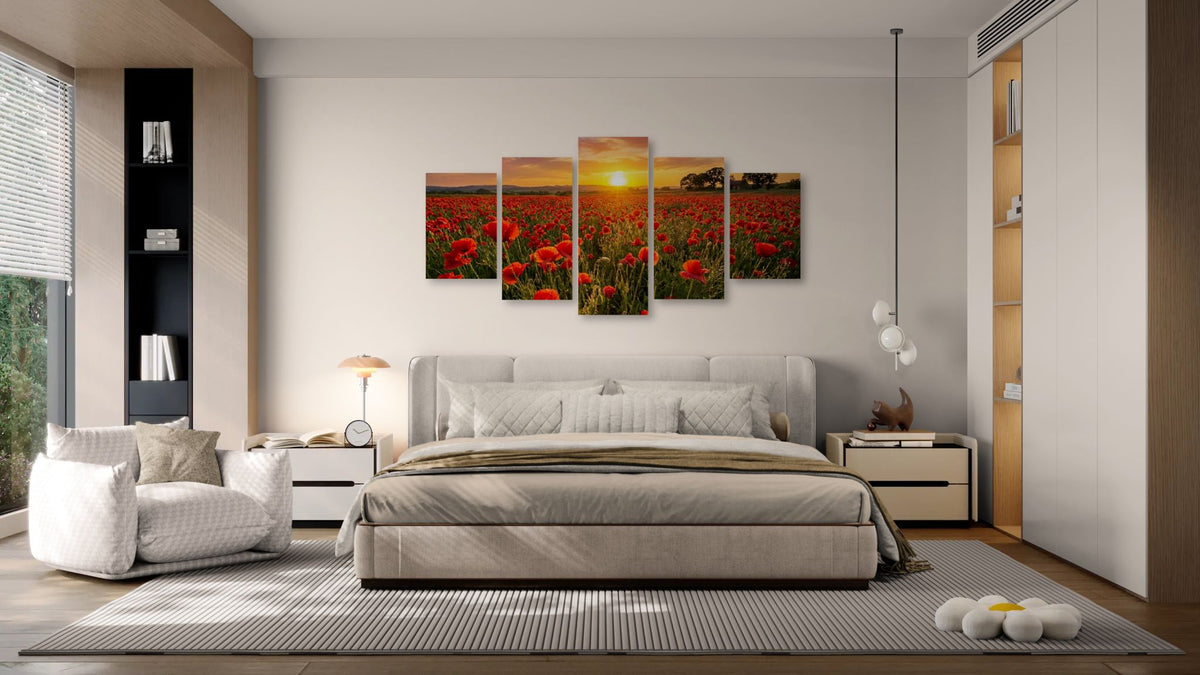 Modern bedroom with a large bed, sofa, and wall art of red poppie flowers.