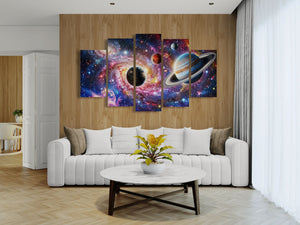 Living room with a white sofa, coffee table, and wall art depicting space scenes.