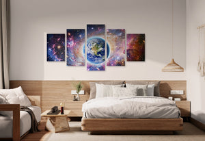 Bedroom with a large bed and wall art depicting space scenes.